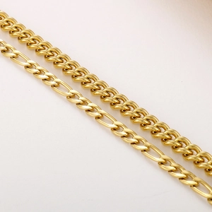 Detailed close-up showing golden Cuban and Figaro link textures for the steel bracelet