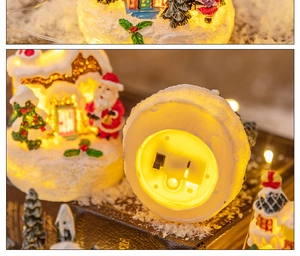 Detail of Christmas glowing snow house bottom with power switch and battery slot