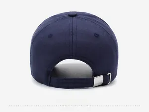 Back view of vintage distressed baseball cap with adjustable metal buckle and navy twill fabric