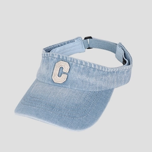 Detailed top view of light blue denim sun visor featuring a large letter C embroidery