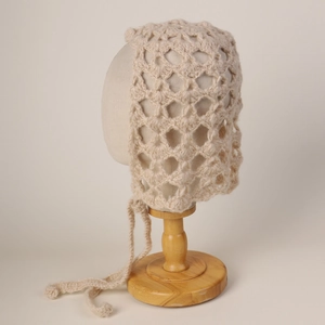 Handcrafted mohair crochet mesh bonnet with tie strap in elegant beige color