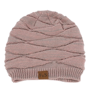 Winter knitted warm beanie hat in vintage pink with textured knit pattern and leather label