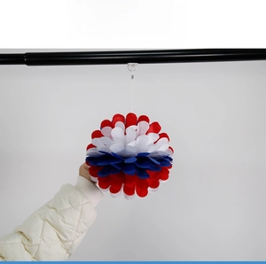 Detail of red white and blue paper honeycomb ball decoration for Independence Day party
