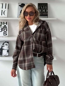 Oversized plaid button-down shirt in brown and grey flannel for a relaxed autumn look