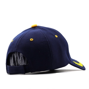 Macro detail of navy baseball cap with yellow embroidery and adjustable back strap
