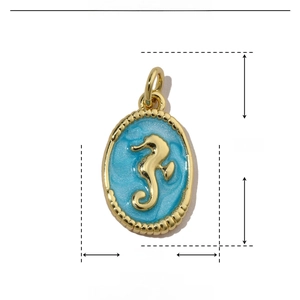 Detail showing dimensions and material of sea horse charm in gold and blue enamel