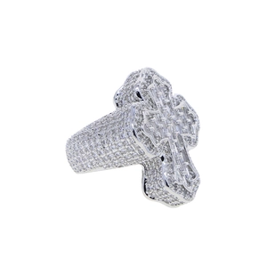 Macro view of silver cross ring with clear cubic zirconia stones in hip hop style