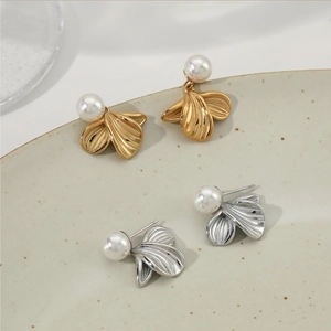 Elegant stainless steel leaf earrings with white pearls in gold and silver finishes