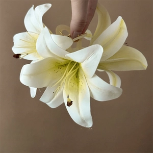 Detailed view of handmade 3D white lily hair claw clip with realistic floral texture