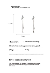 Détail des boucles d'oreilles papillon à pompons avec perles, mesure de 12,7 cm