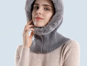 Detail of grey knitted balaclava with warm faux fur lining for head and neck protection