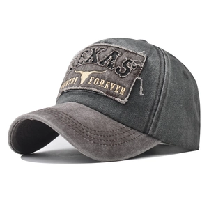Vintage washed cotton baseball cap featuring Texas bull embroidery in a charcoal gray finish
