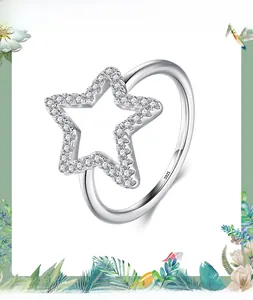 Macro view of S925 sterling silver ring showing hallmark and micro-pave star motif