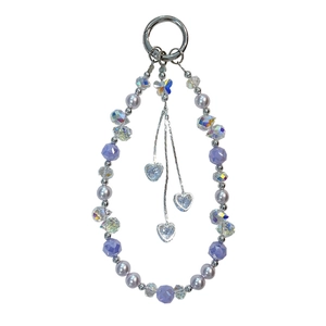 Elegant beaded phone strap with crystal butterfly, pearls, and heart charms on white background.