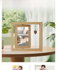 Close-up of a rotating wooden photo frame with a golden retriever photo and heart pendant