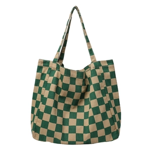 Minimalist green checkerboard canvas tote bag with reinforced handles on white background