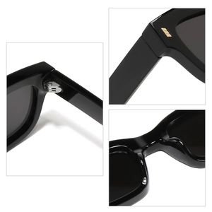 Lunettes de soleil carrées noires rétro avec charnières en métal et détails dorés
