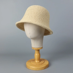 Breathable beige hollow knit bucket hat for women on professional head display