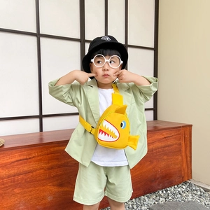 Toddler cute yellow shark cartoon crossbody bag with adjustable strap worn by child