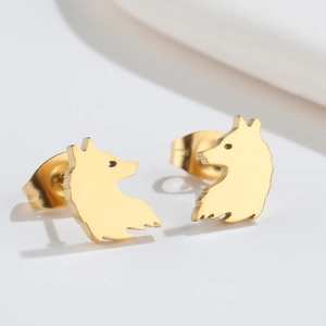 Macro side view of golden wolf animal silhouette stud earring with secure back closure