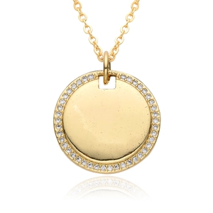 Minimalist gold necklace featuring a circular pendant with micro-set white zircon stones