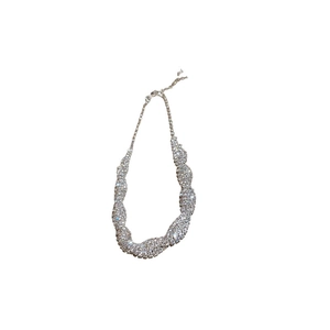 Silver-toned luxury twisted jewelry set with sparkling rhinestones and adjustable clasp