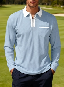 Detail of light blue long sleeve polo shirt with zipper collar and chest pocket detail