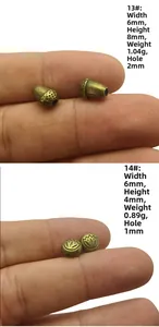 Detail of bronze alloy beads showing acorn shape and embossed lotus flower patterns