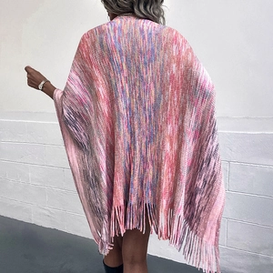 Women's multicolored knit shawl poncho with fringe tassels and mixed stripe pattern