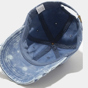 Vintage washed blue denim baseball cap with adjustable metal buckle and soft top