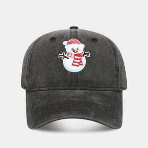Close-up of cute snowman embroidery on a washed black vintage style baseball cap
