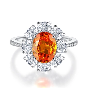 Luxurious S925 silver ring with 3 carat oval orange stone and halo diamond design