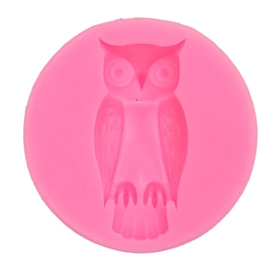 Close-up of pink silicone owl mold for Halloween fondant cakes and DIY crafts