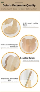 Detail of wooden bear makeup mirror showing stable base and natural grain finish