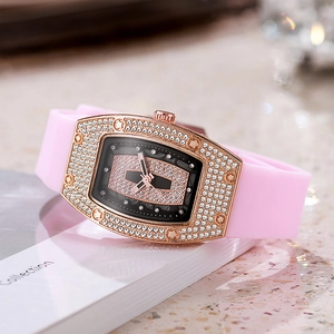 Tonneau women's quartz watch with pink silicone strap and crystal encrusted bezel