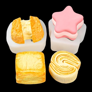 Silicone mold set for DIY food-shaped toast and star-shaped soap making on black background