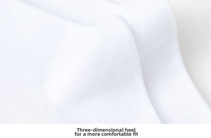 Detail view of the 3D ergonomic heel design on white knitted chicken feet socks