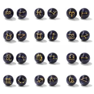 Detail of 10mm blue goldstone beads featuring golden 12 zodiac symbols for DIY jewelry