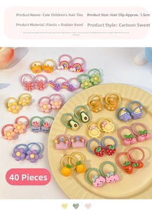 Close-up of colorful cartoon fruit and flower hair accessories set for kids and girls