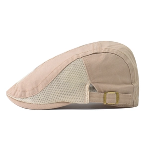 Close-up of light khaki beret cap with breathable mesh side panels and metal buckle