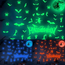 Luminous Halloween wall stickers showing green blue and orange neon glowing effects in dark