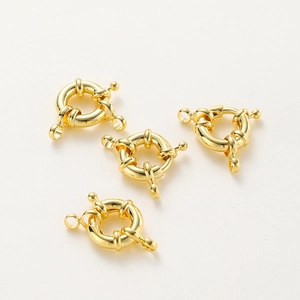 Detail of four 14k gold plated spring sailor clasps for DIY jewelry making