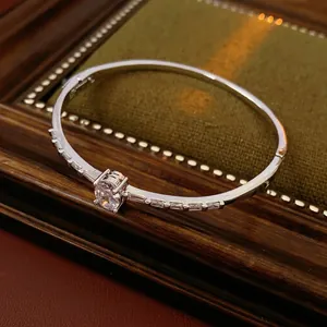Elegant Copper Bangle Bracelet With Oval Zircon Main Stone And Baguette Side Stones Luxury Fashion Jewelry For Women
