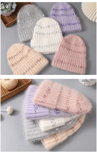 Detailed close-up of sequined rabbit fur knit beanies in multiple pastel colors