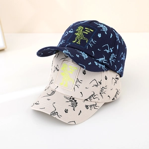 Detail of dinosaur skeleton print on cotton baseball caps with embroidered patches