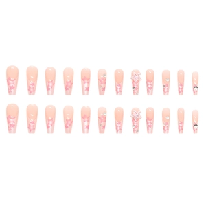 Long coffin false nails with pink gradient, sparkling stars and pearl accents set