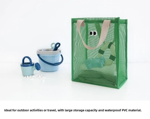 Detailed view of green mesh PVC beach bag with large eyes pattern and waterproof design