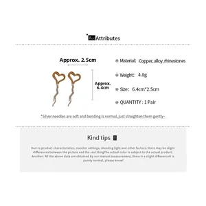 Detail showing dimensions of heart fringe earrings with rhinestones and copper alloy finish