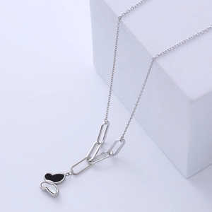 Silver butterfly necklace with black and white pendant on paperclip and fine chain
