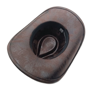 Detail of internal black sweatband and polyester fabric texture on a vintage fedora